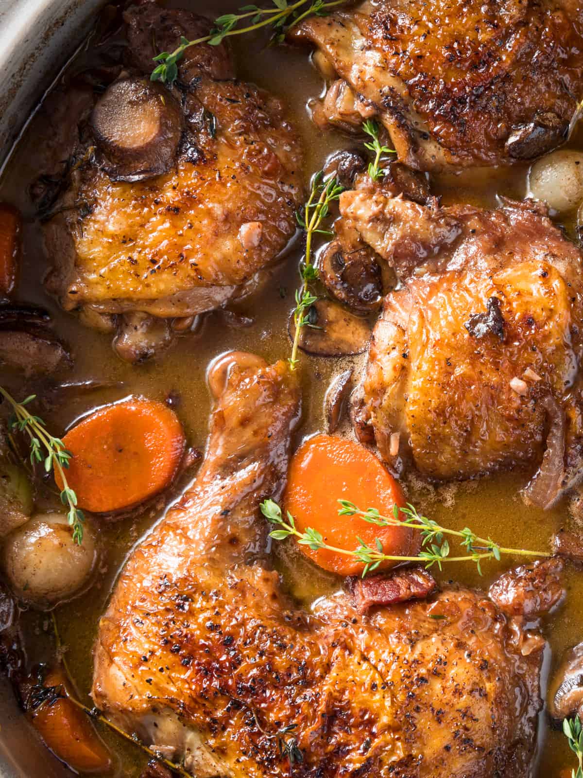 coq au vin recipe best traditional French braised chicken authentic Julia Child bacon onions mushrooms wine