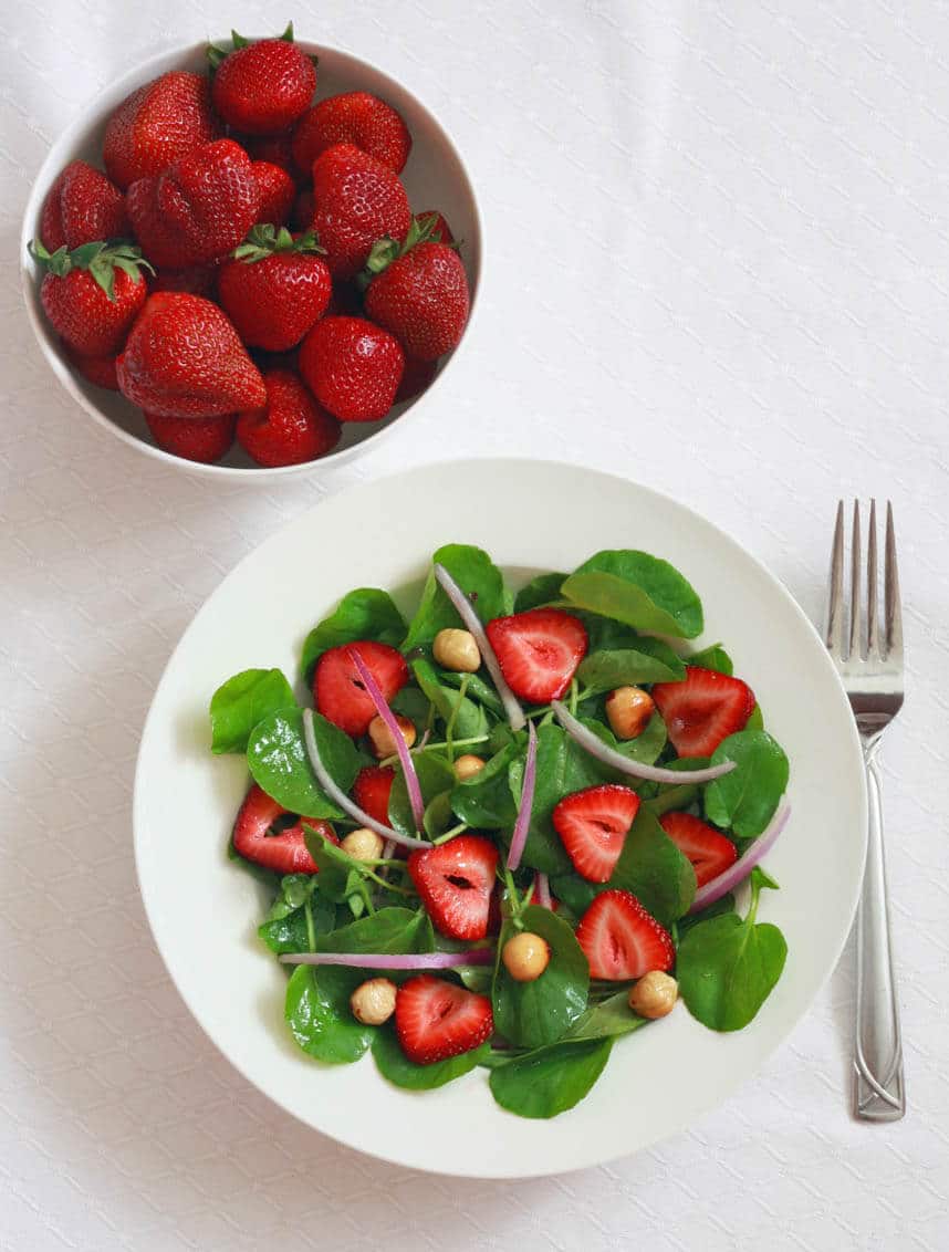 Watercress Salad strawberries hazelnuts red onions vinagraitte