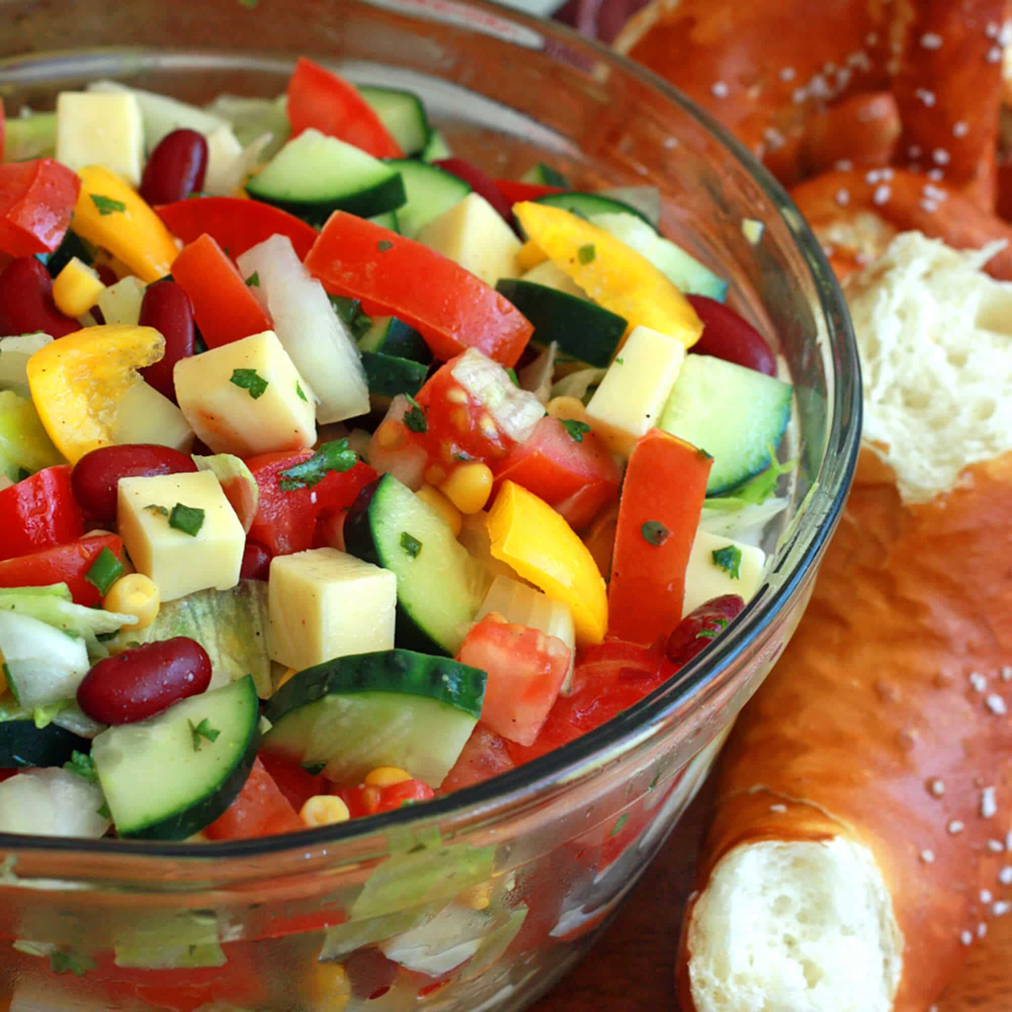 german picnic salad recipe cheese cucumbers tomatoes pepper kidney beans corn vinaigrette herbs