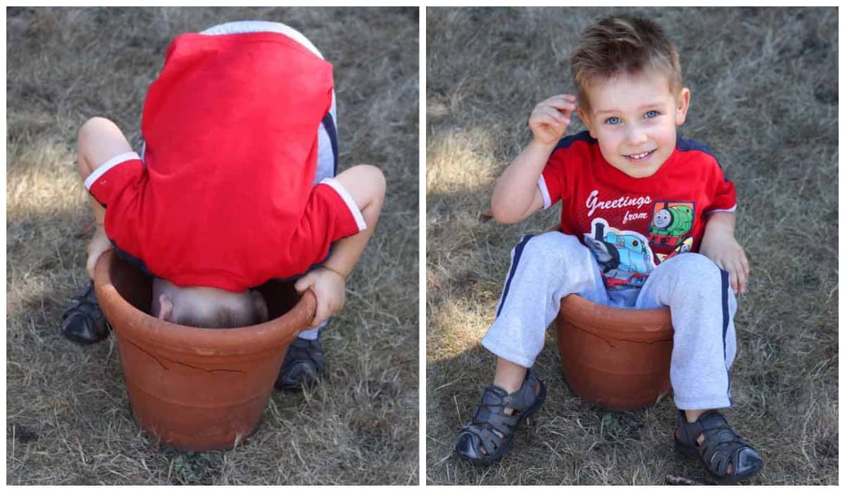 young boy with flower pot