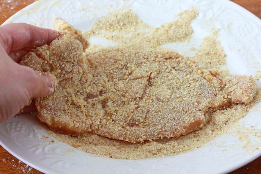 dredging meat in breadcrumbs