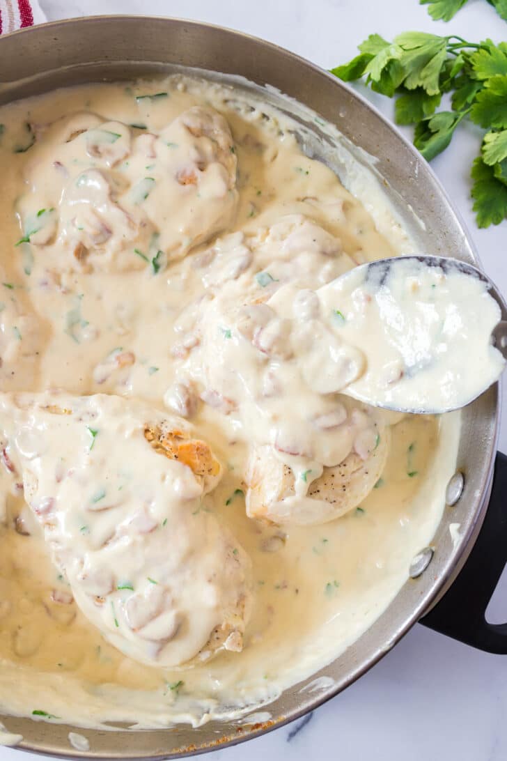 smothered chicken recipe creamy mushroom bacon sauce