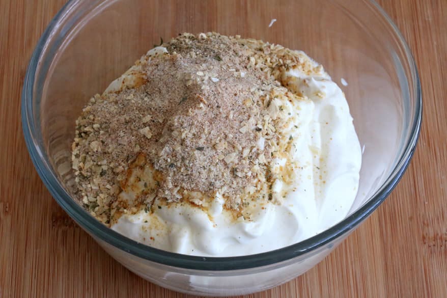 adding dry ingredients to sour cream