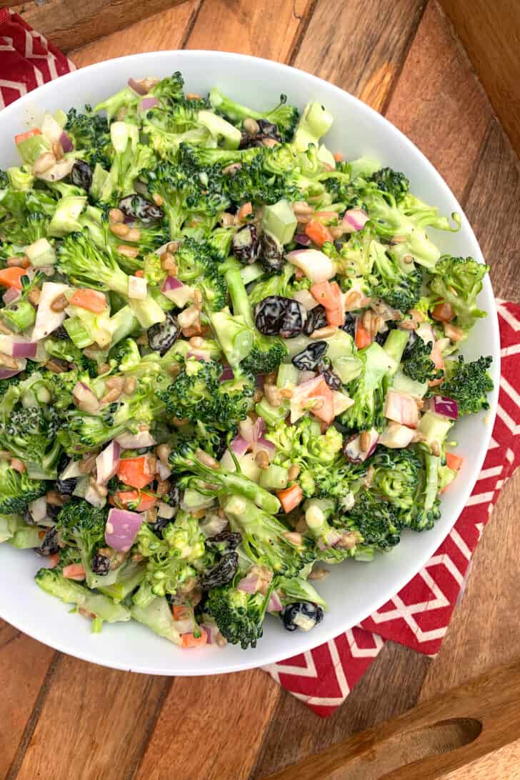 broccoli salad recipe best creamy raisins dried cranberries sunflower seeds onions vegetarian vegan deli style