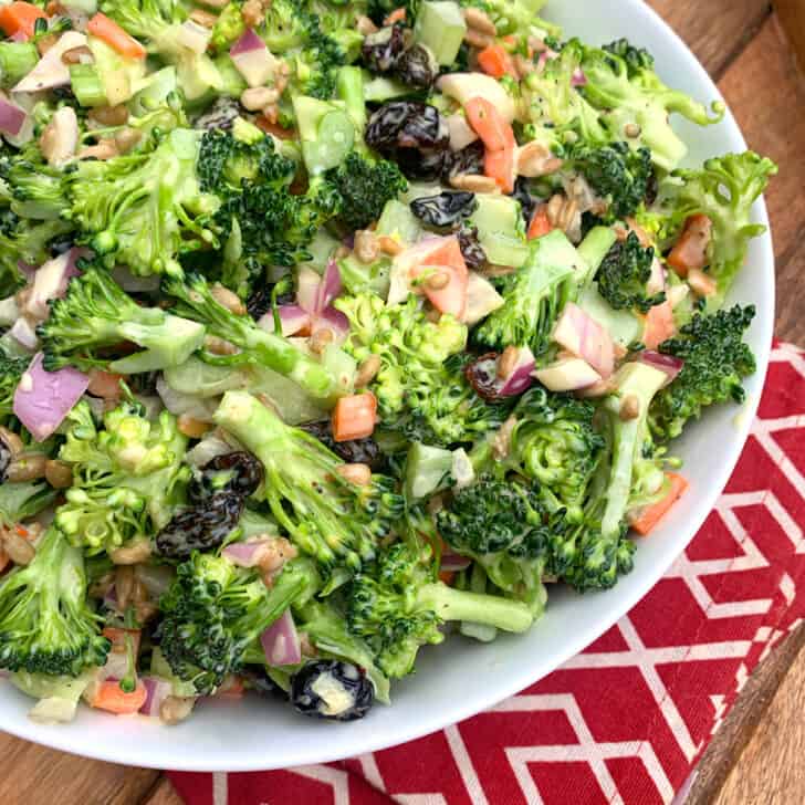 broccoli salad recipe best creamy raisins dried cranberries sunflower seeds onions vegetarian vegan deli style