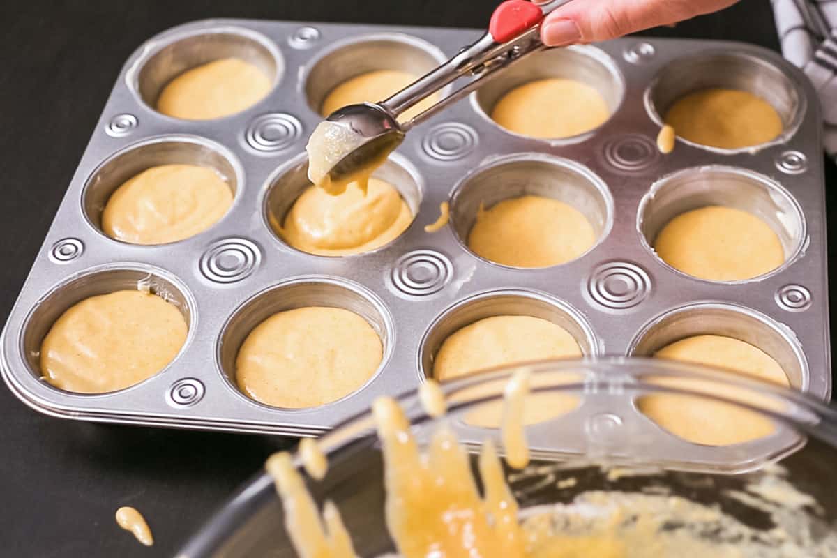 spooning batter into pan