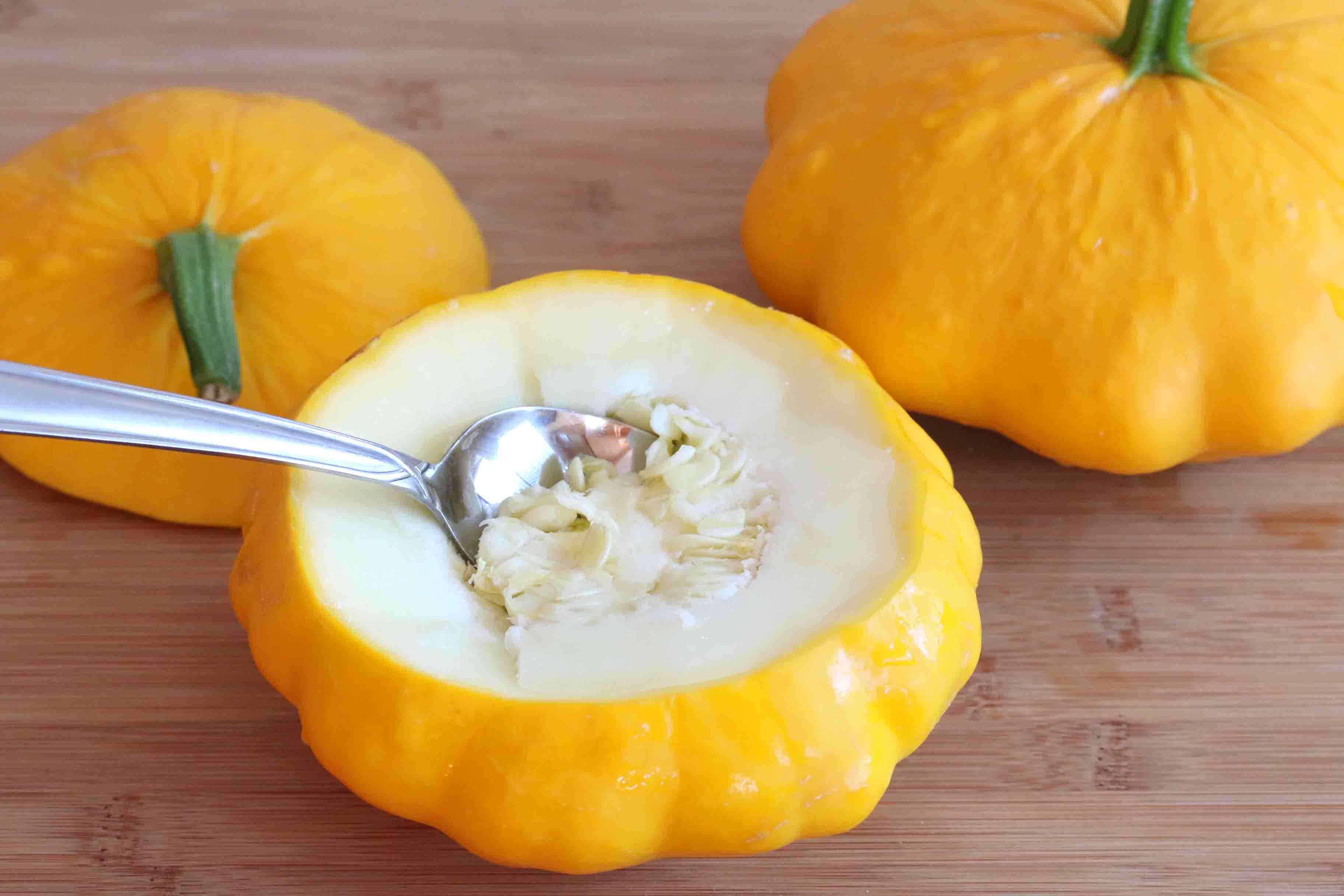 scooping out inside of squash