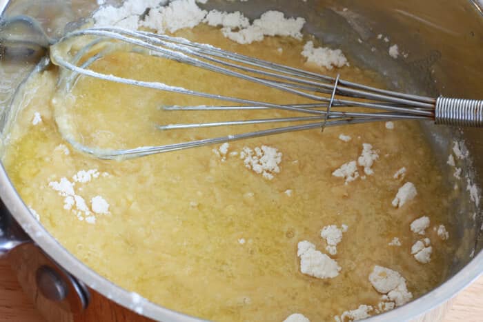 mixing flour and butter in saucepan