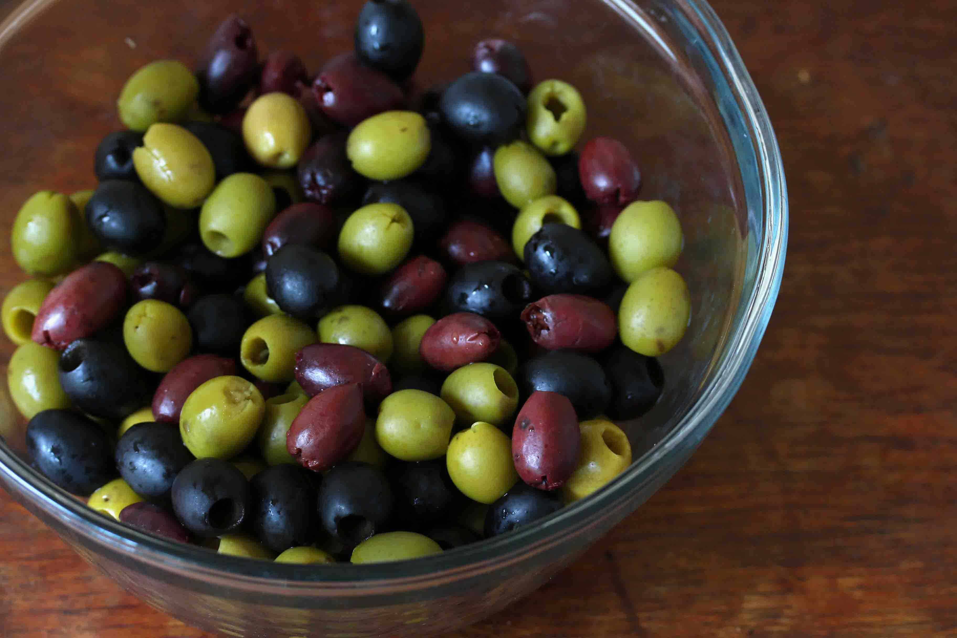 olives in a glass bowl