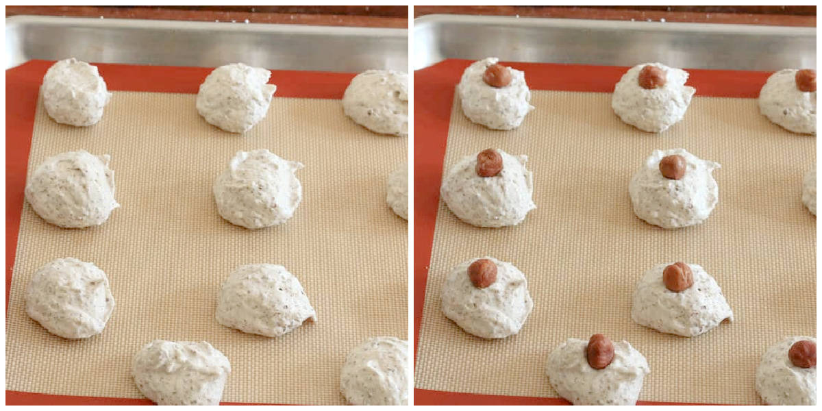 placing cookie batter on baking sheet with whole hazelnuts 