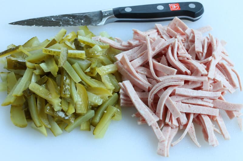 slicing pickles and meat
