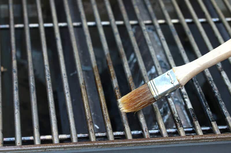 brushing bbq grates with oil