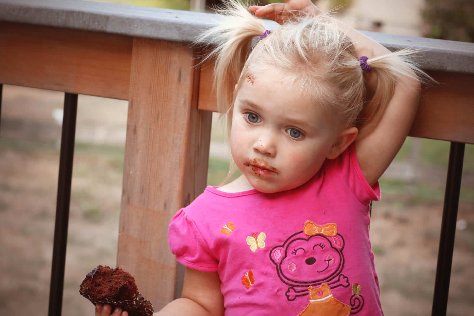 girl eating cupcake