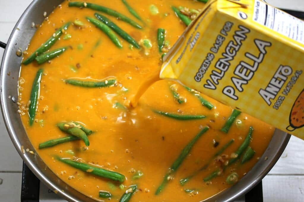 pouring in the broth