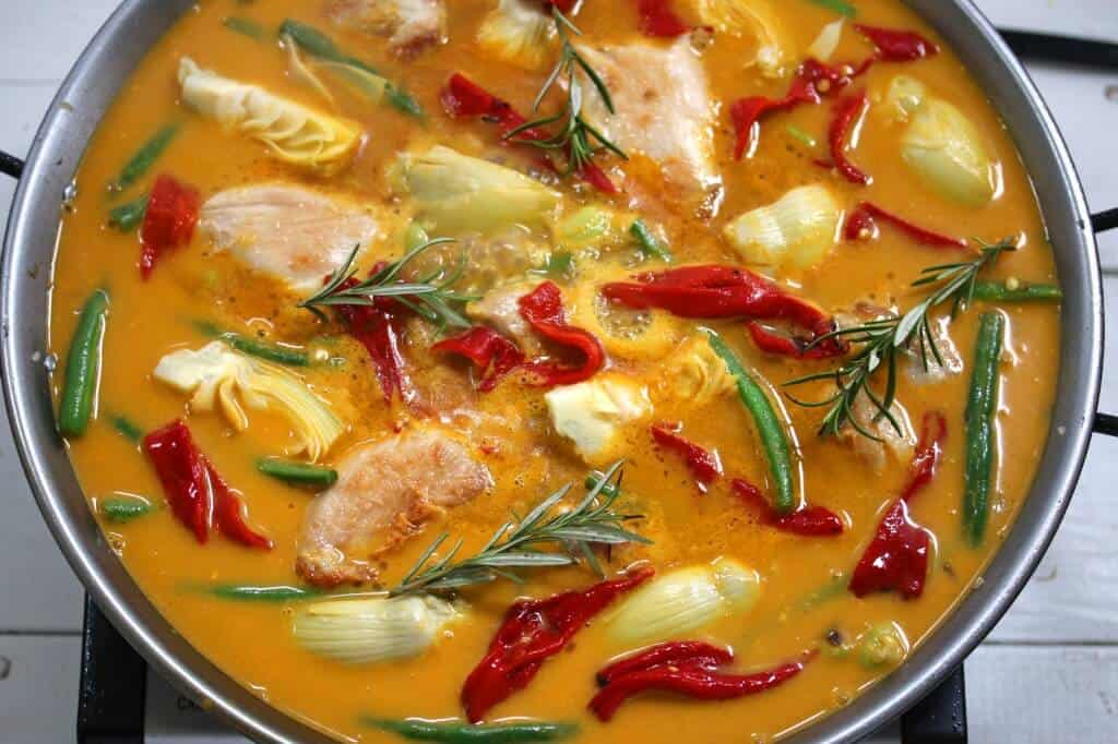 valencian paella recipe traditional authentic rice artichokes beans piquillo peppers