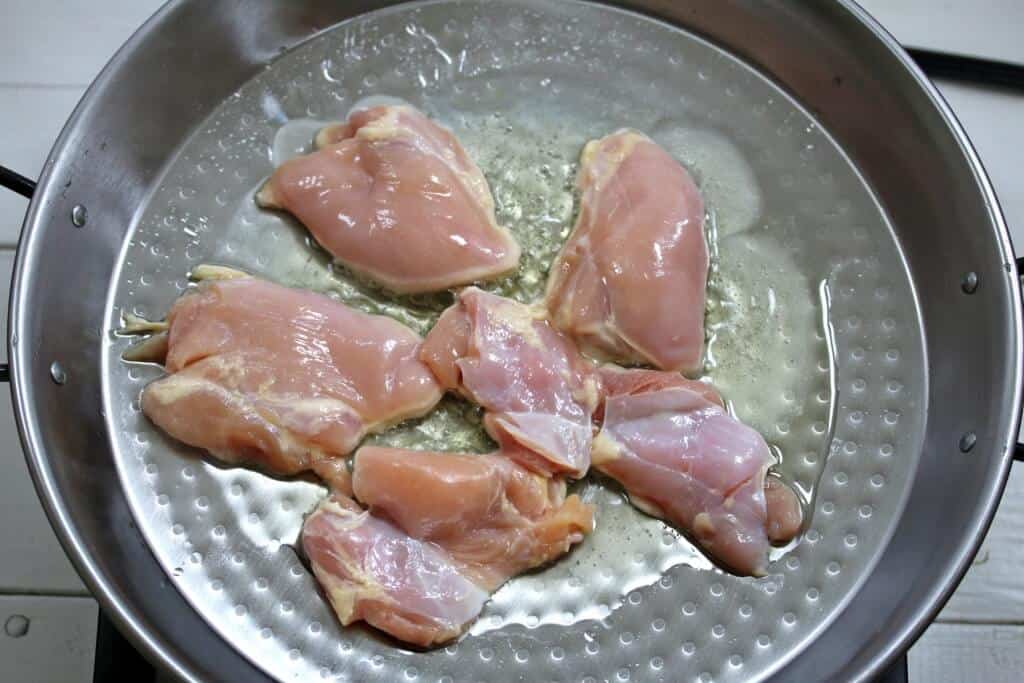 frying chicken in the pan