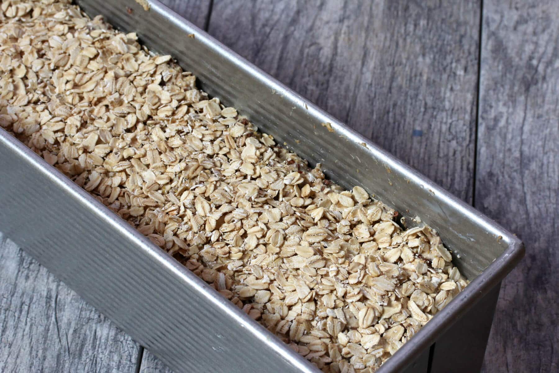 sprinkle the oats on top of the batter