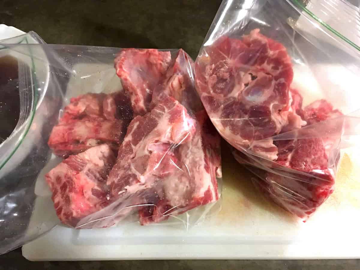 placing the pork in ziplock bags