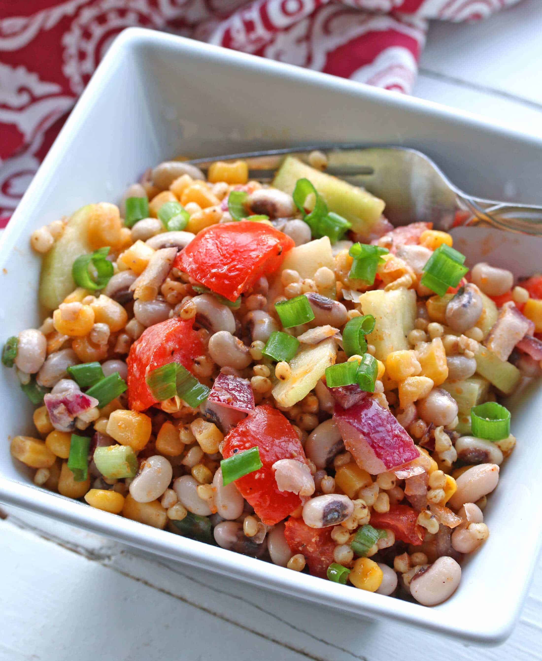 sorghum grain salad black eyed peas southern recipe healthy vegetables vinaigrette dressing smoked paprika cucumbers tomatoes corn