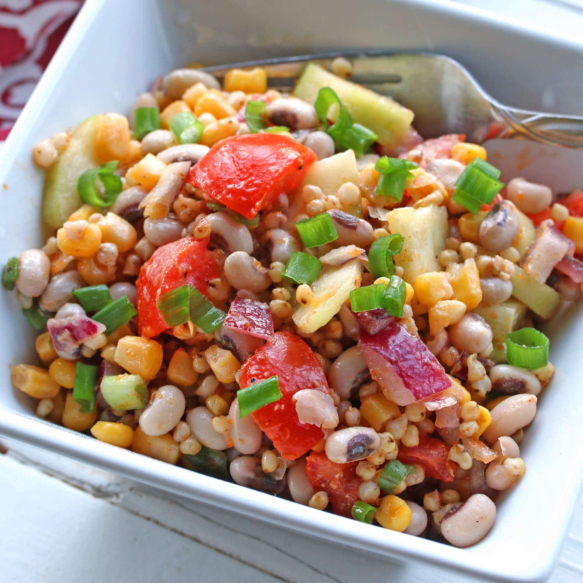 sorghum grain salad black eyed peas southern recipe healthy vegetables vinaigrette dressing smoked paprika cucumbers tomatoes corn