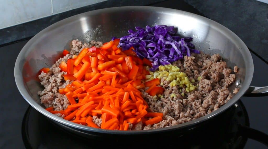 adding and cooking the veggies