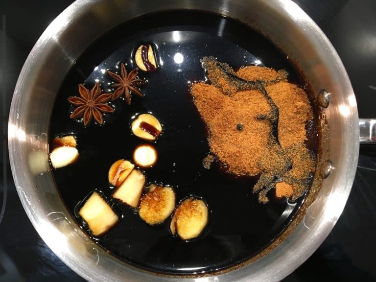 adding ingredients to saucepan