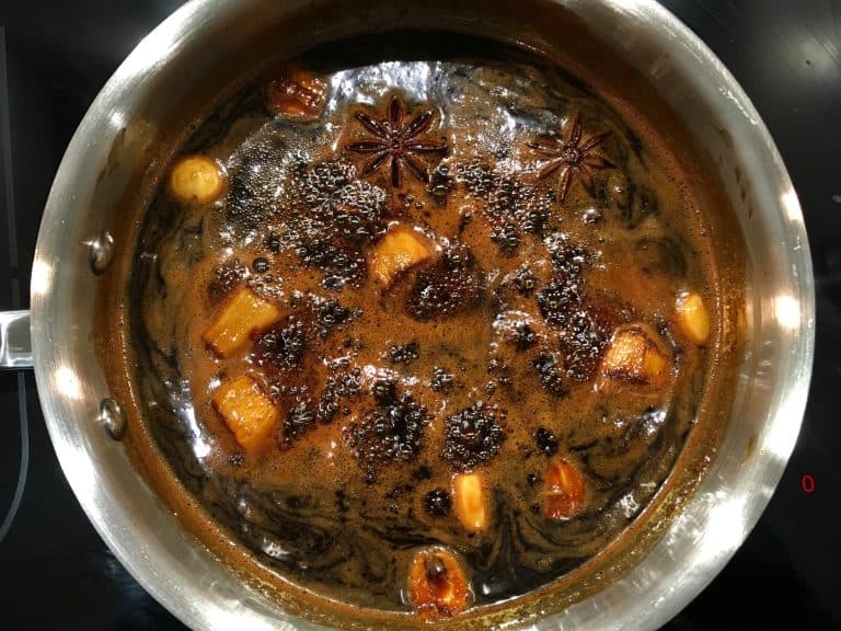 simmering sauce on stove