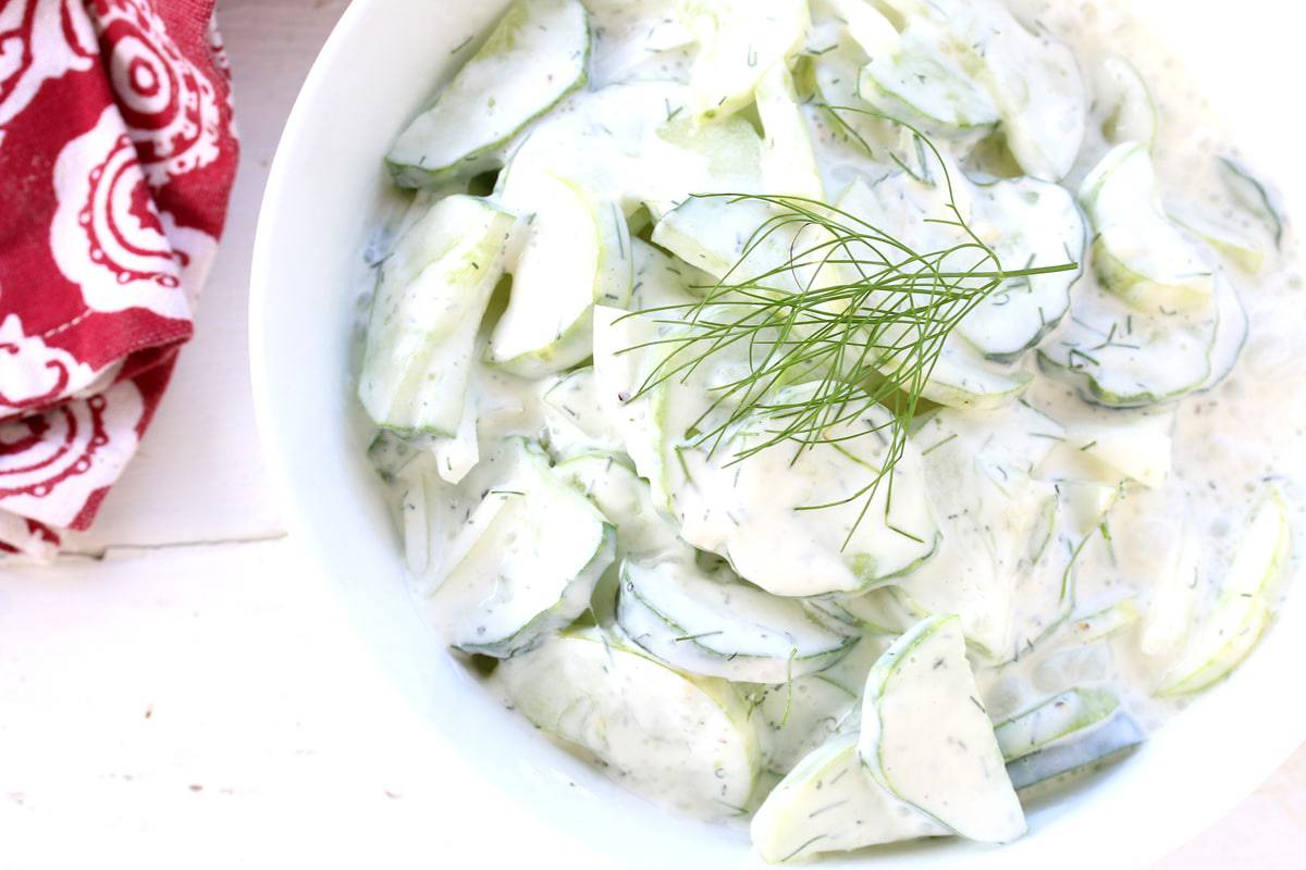 creamy german cucumber salad recipe sour cream dill onions herbs