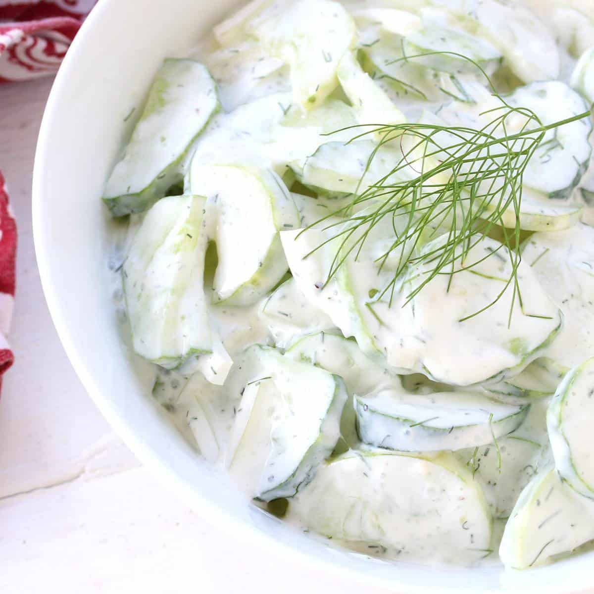 creamy german cucumber salad recipe sour cream dill onions herbs