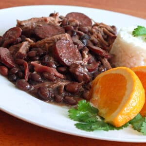 feijoada recipe Brazilian black bean stew sausage smoked meats pork beef linguica Portuguese oranges rice