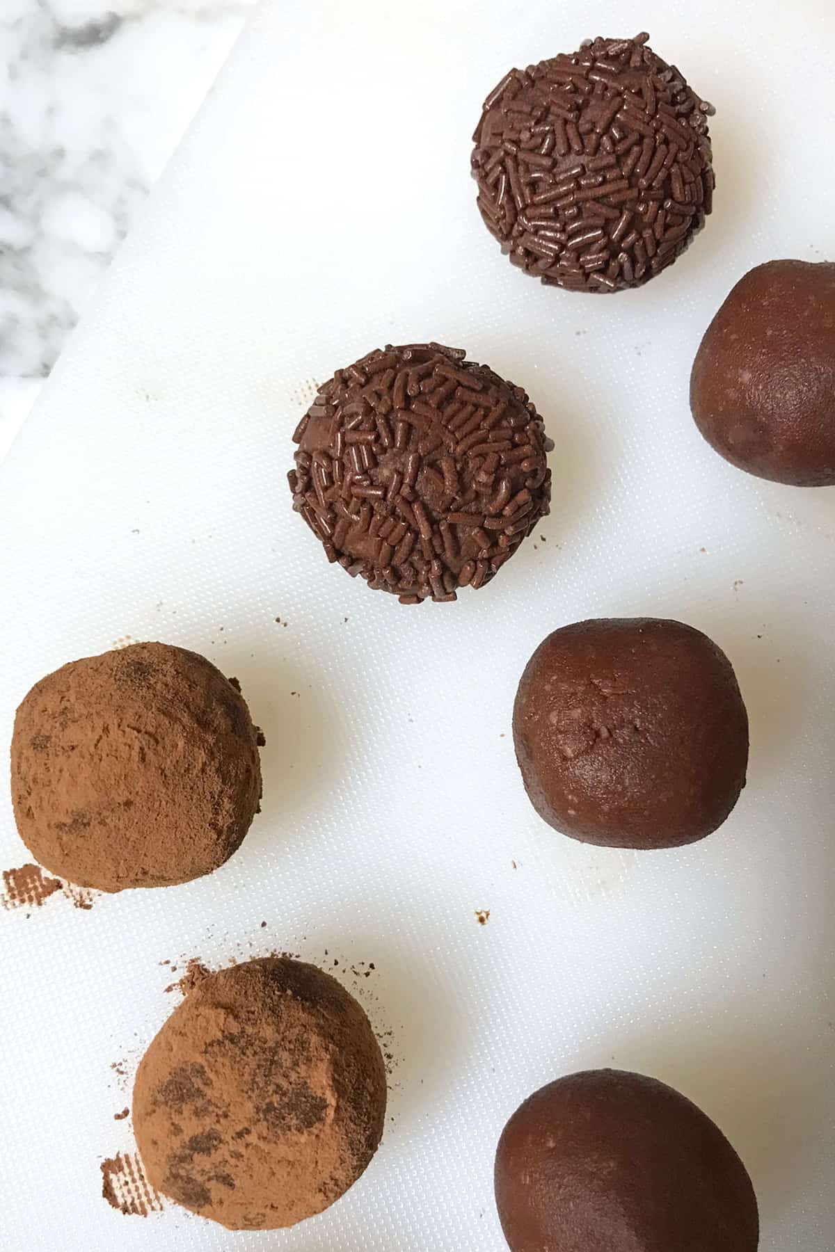german rum balls recipe rumkugeln traditional German chocolate almonds rum cocoa powder chocolate sprinkles