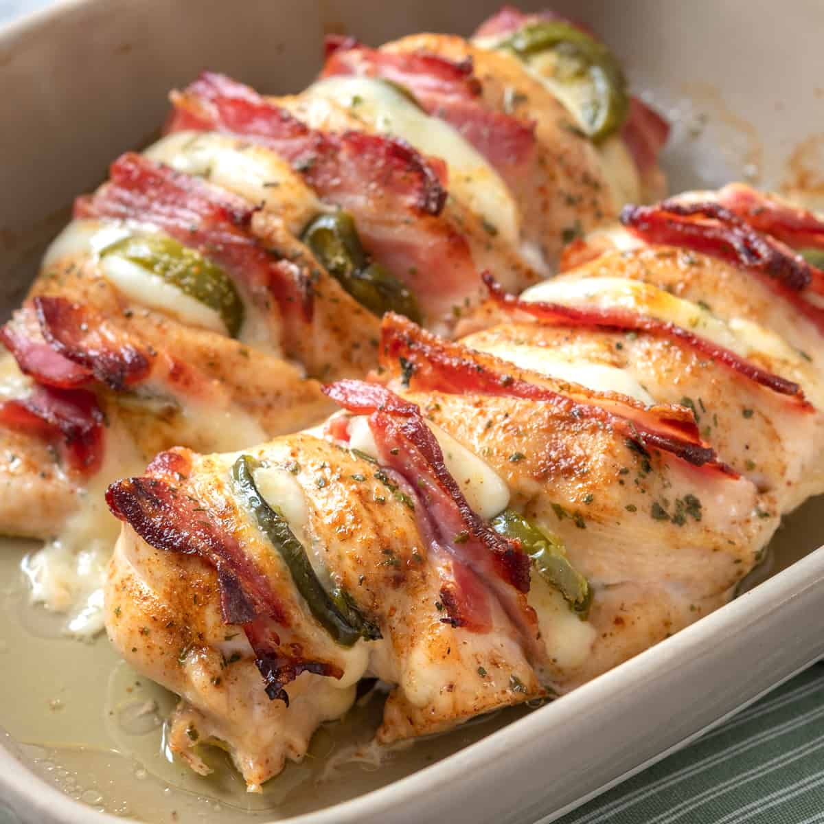 hasselback chicken recipe bacon cheese smoked ham jalapenos roasted bell peppers sun dried tomatoes caprese baked