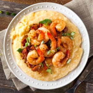 shrimp and grits recipe traditional southern andouille sausage bacon peppers onions cajun creole seasoning creamy cheese