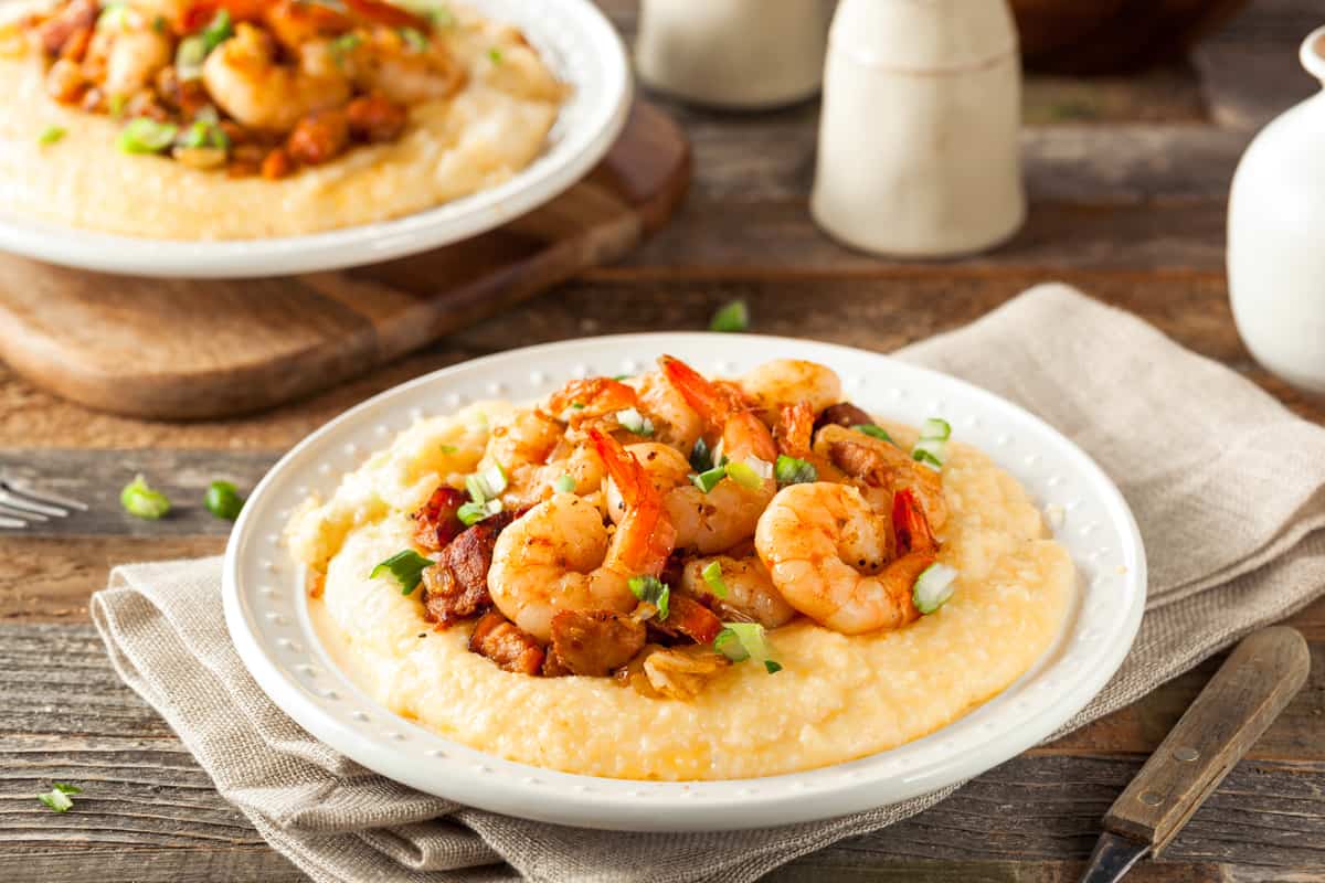 shrimp and grits recipe traditional southern andouille sausage bacon peppers onions cajun creole seasoning creamy cheese