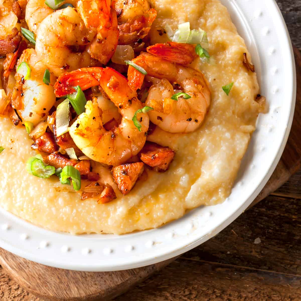 shrimp and grits recipe traditional southern andouille sausage bacon peppers onions cajun creole seasoning creamy cheese