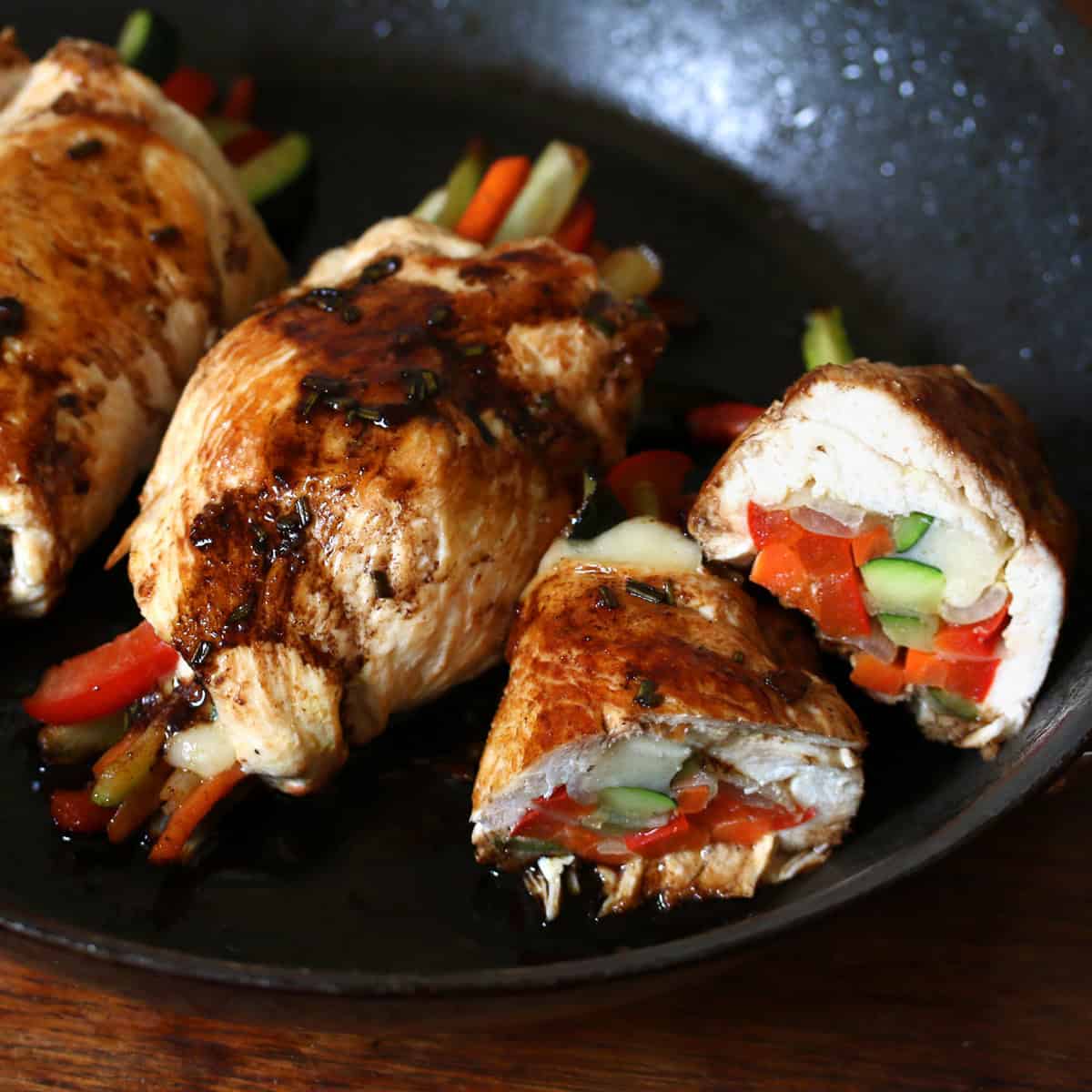 chicken roll ups recipe balsamic glaze reduction Swiss cheese Dijon mustard vegetables bell peppers zucchini leek onions