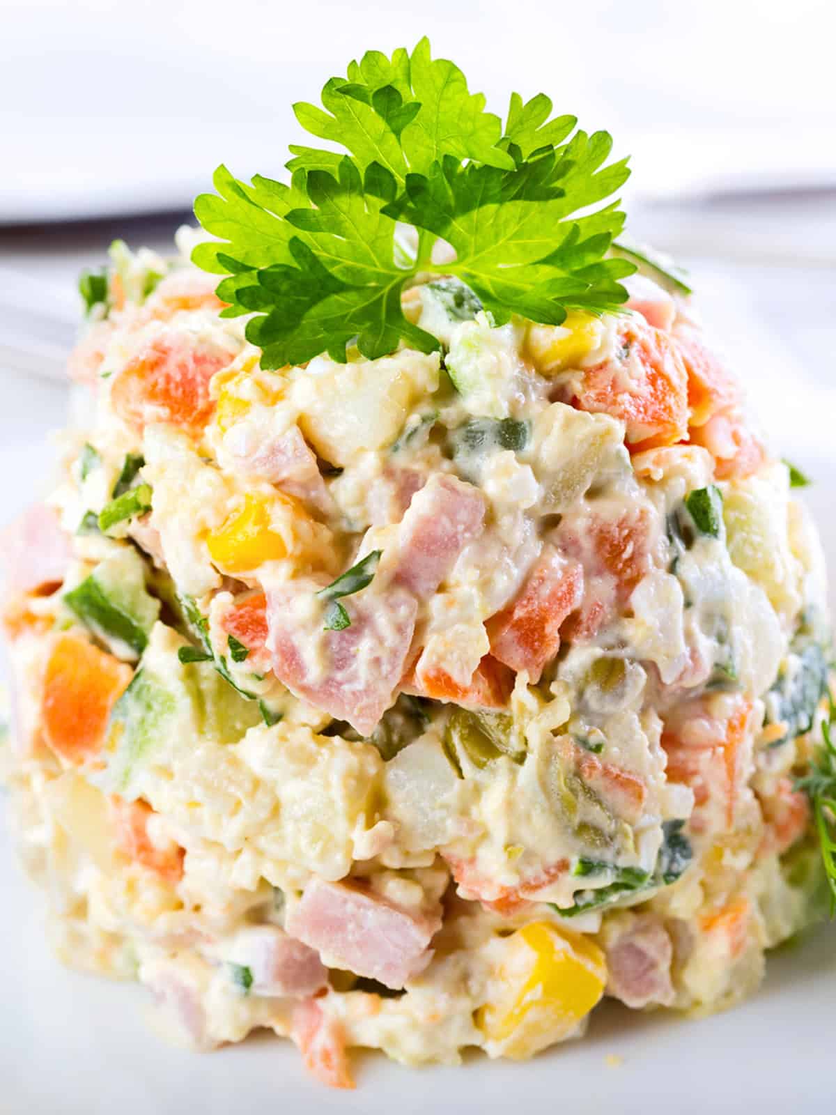 olivier salad recipe russian potato authentic traditional old fashioned olivye ham cucumbers peas peppers capers eggs