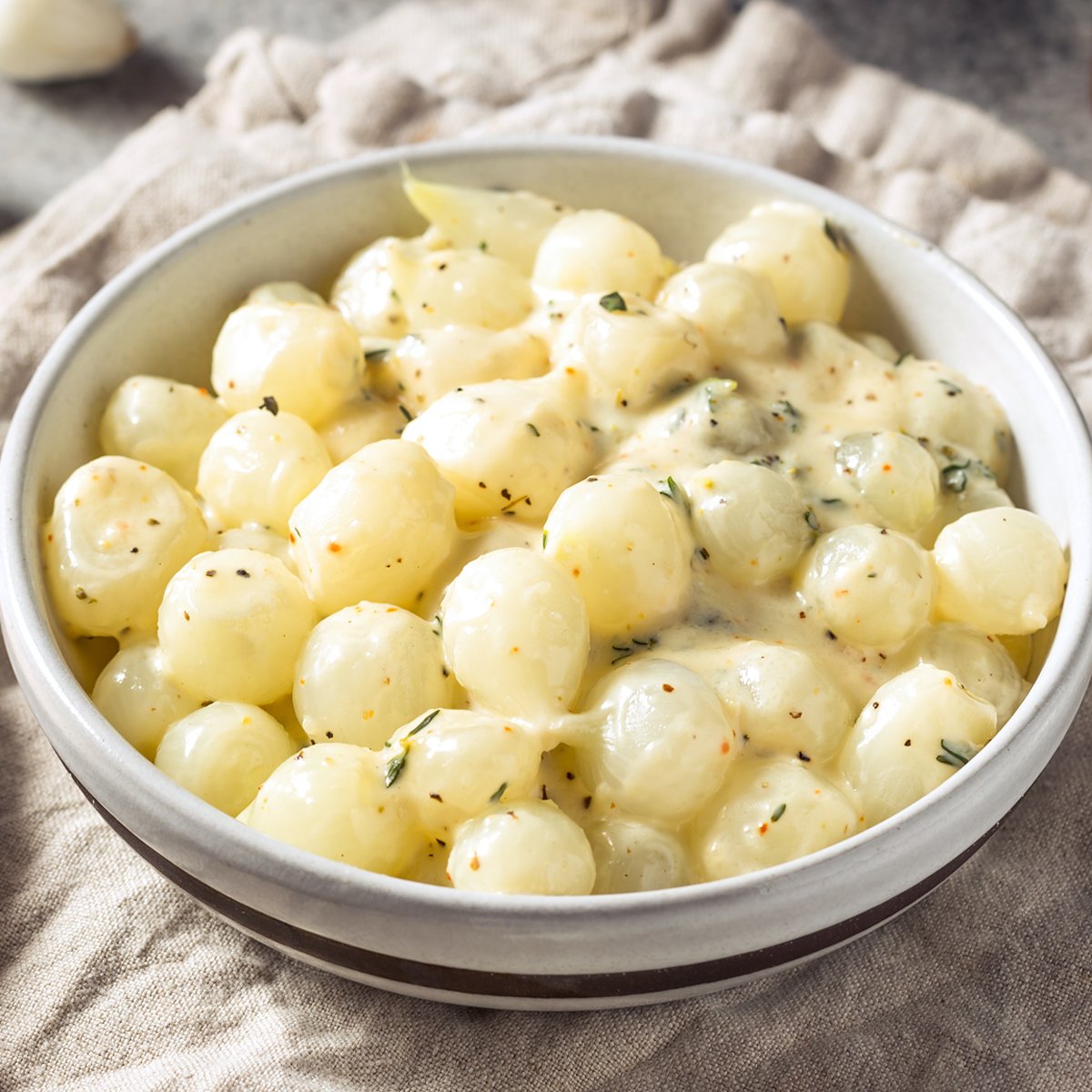 creamed onions recipe pearl white heavy cream herbs thyme sage cheese easy best elegant gourmet
