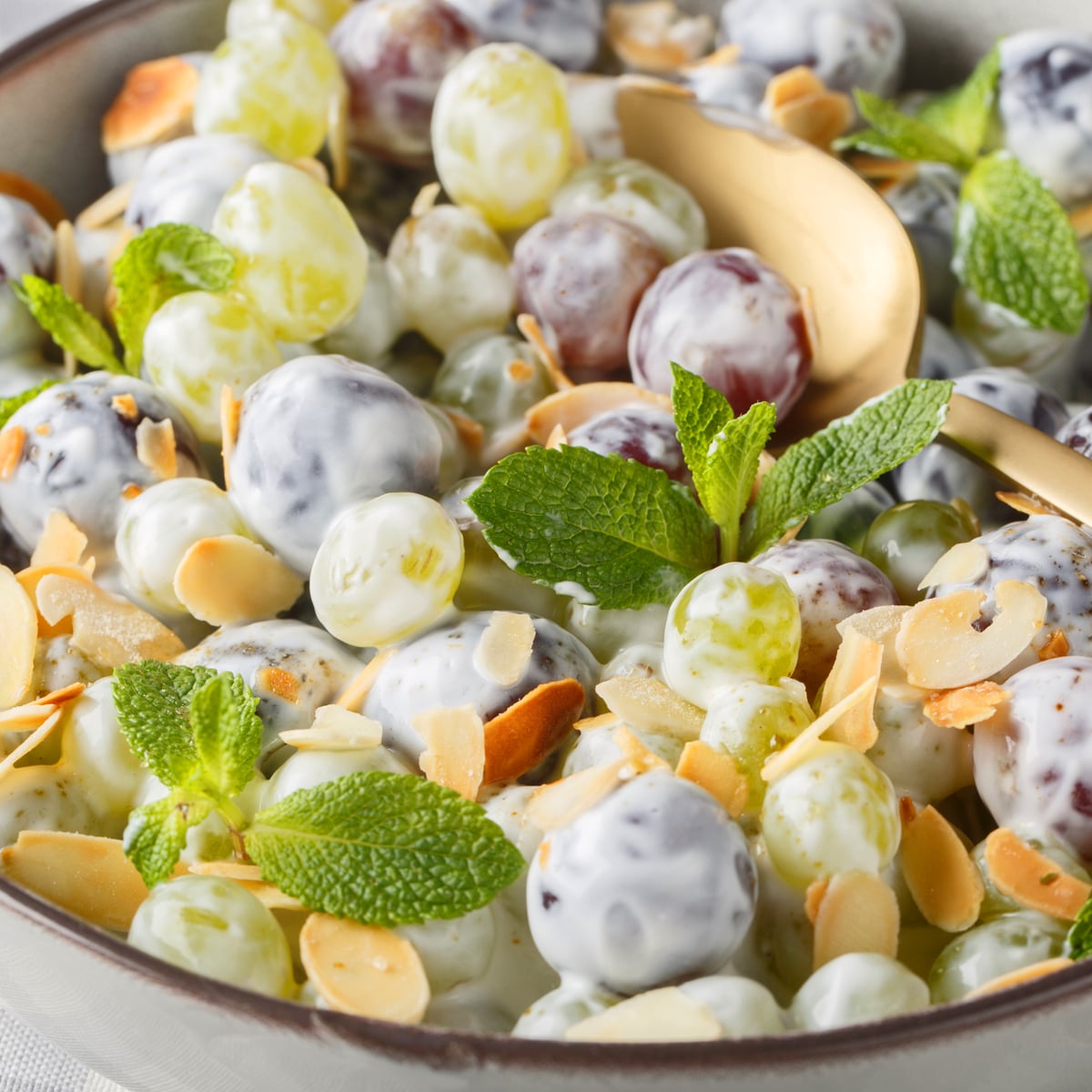 grape salad recipe best classic creamy easy sour cream cheese brown sugar vanilla almonds pecans walnuts nuts